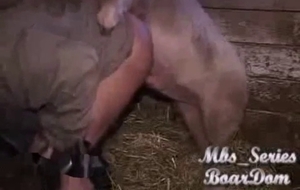 Farmer with a big butt gets banged by a horny pig